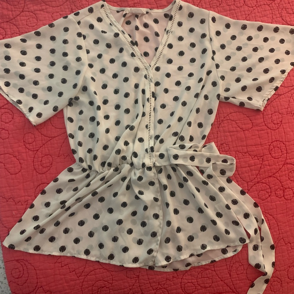 Polka dotted white and black top